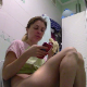 An Eastern-European girl sits on a toilet, eats a banana, pisses, looks at her phone, then takes a shit at about 3:28 into the clip. Multiple, gentle plops are heard. Product is shown in the bowl. Presented in 720P HD. 111MB, MP4 file. About 6 minutes.
